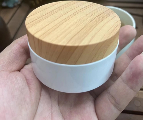Bambu de madeira plástico do frasco do creme da tampa 100ml 200ml da grão para o OEM cosmético